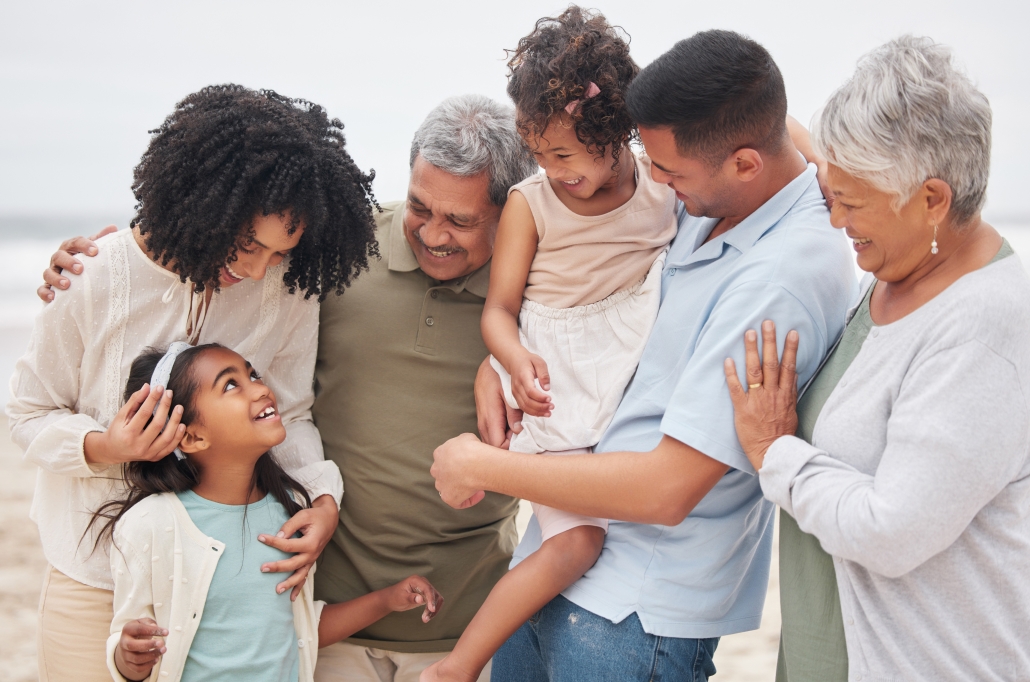 beach-big-family-happy-grandparents-with-children-nature-enjoy-holiday-vacation-new-zealand-travel-hug-proud-father-sea-ocean-with-kids-care-mom-relax-bond-together