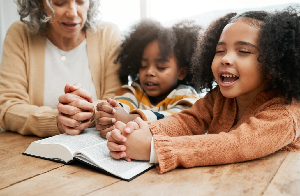 bible-worship-grandmother-praying-with-kids-siblings-prayer-support-hope-christianity-children-education-family-old-woman-studying-reading-book-learning-god-religion