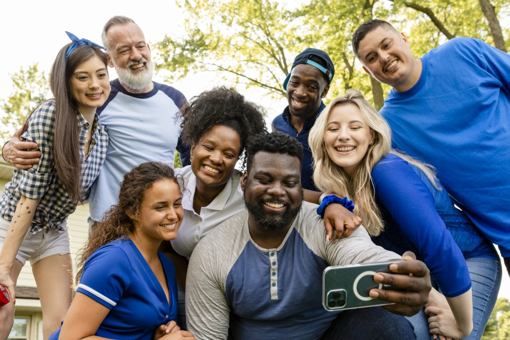 Friends taking a selfie at a tailgate party