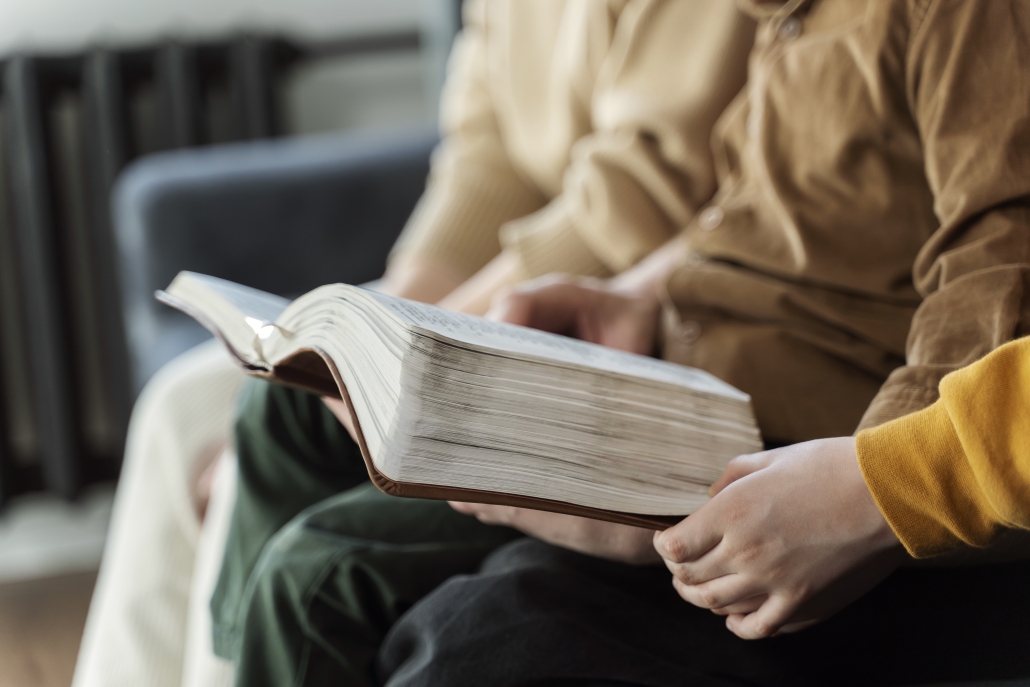 side-view-christian-family-reading-bible